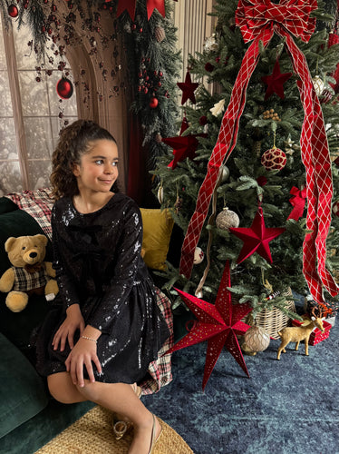 Ensemble top et jupe en sequin noir, noeuds en velours